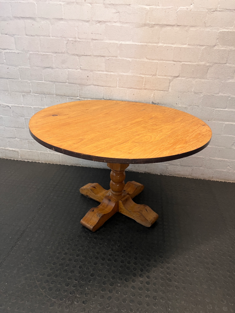 Round Wooden Pedestal Dining Table