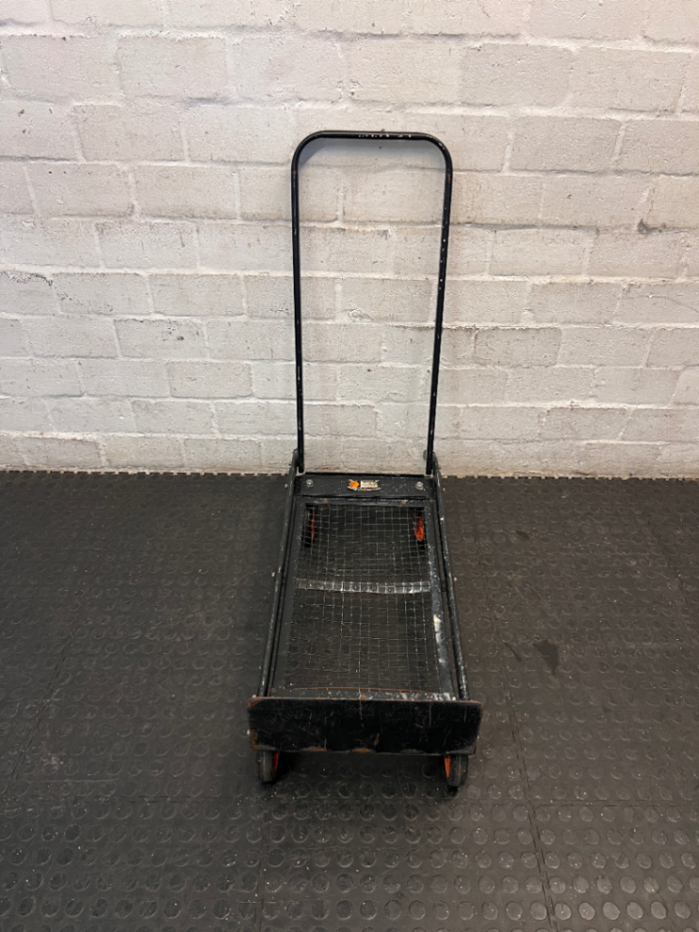 Black Metal Platform Trolley with Mesh Base — Fair Used Condition with Visible Wear