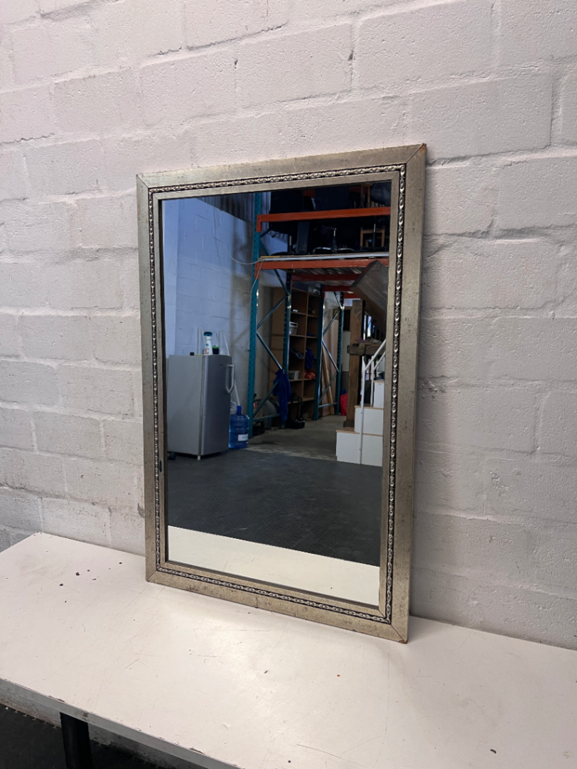 Rectangular Silver-Toned Mirror with Ornate Frame Detail