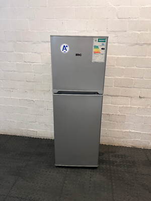 KIC Top-Mount Fridge Freezer in Silver — Working Order with Chipped Door Shelf
