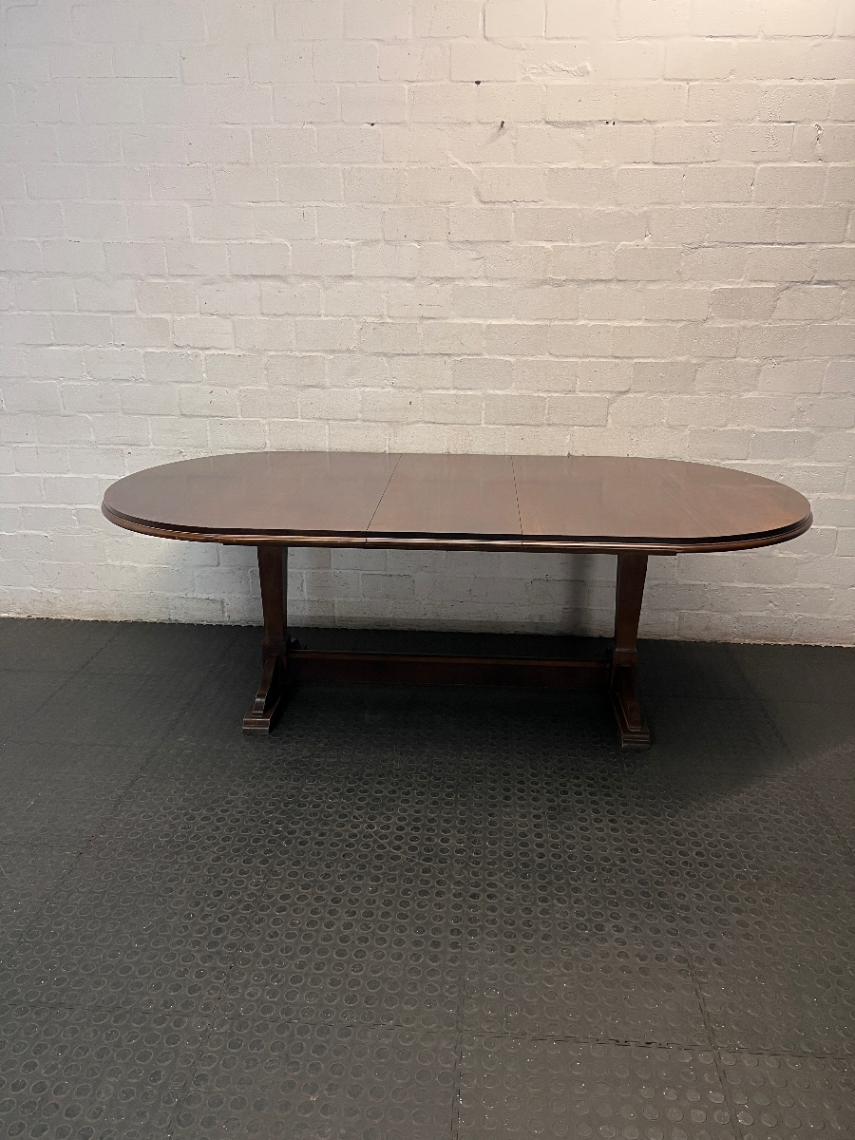 Oval Dark Wood Trestle Dining Table