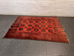 Intricate Red Persian Style Fringed Rug — Fair-Used Condition