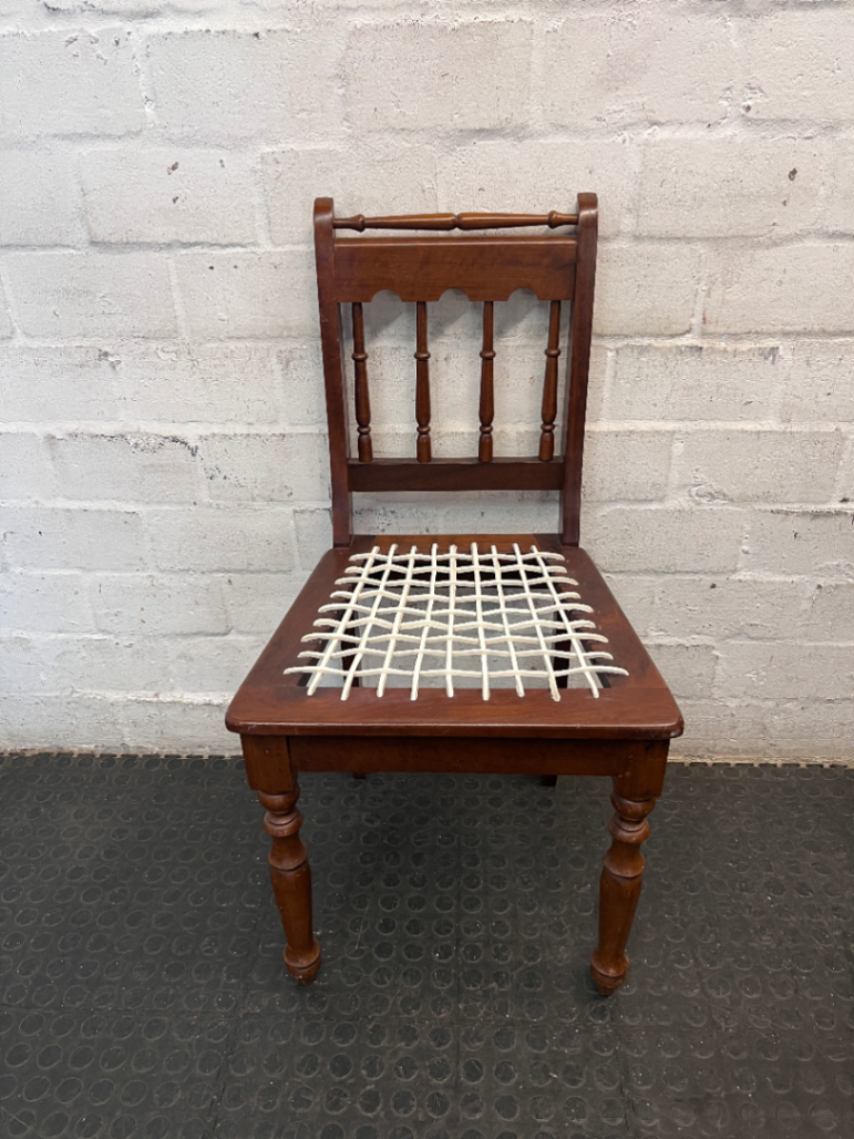 Traditional Brown Wooden Dining Chair with Woven Seat — Overall Good Condition