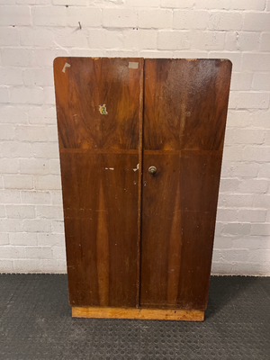 Vintage Dark Wood Two-Door Cupboard — Vintage Condition with Surface Wear and Stickers
