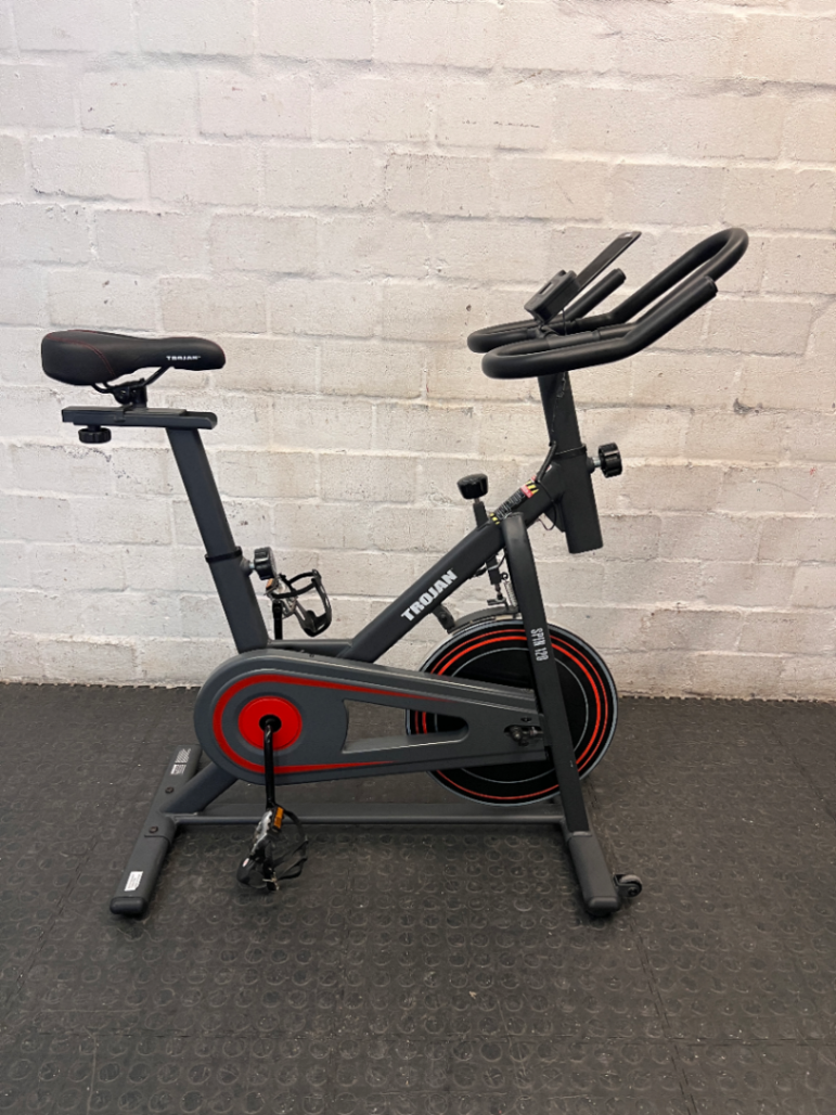 Trojan Spin 120 Exercise Bike in Dark Grey — Good Working Order; Missing Sticker on Wheel