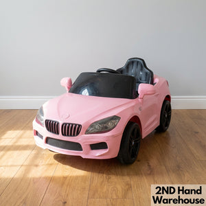 Kids pink electric car  - Pink Kids Electric Ride-On Car Toy - Has no charger - 2ndhandwarehouse.com