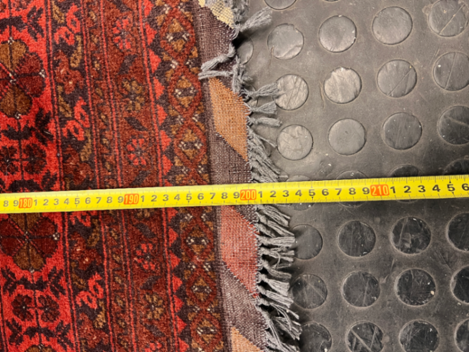 Intricate Red Persian Style Fringed Rug — Fair-Used Condition