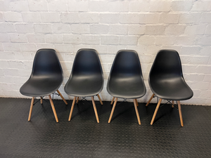 Sleek Black Mid-Century Modern Dining Chairs with Wooden Legs - 2ndhandwarehouse.com
