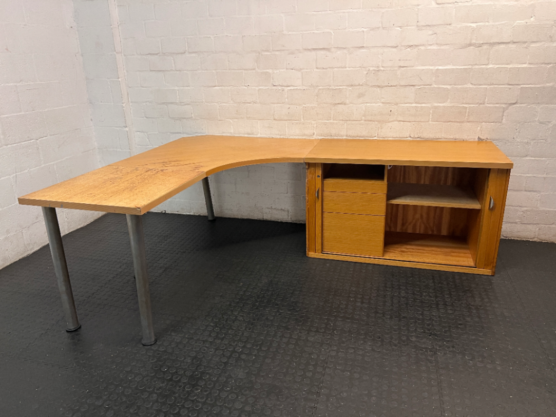 Light Oak L-Shaped Office Desk with Roller Shutter Credenza — Good Working Order with Water Damage on Surface - 2ndhandwarehouse.com