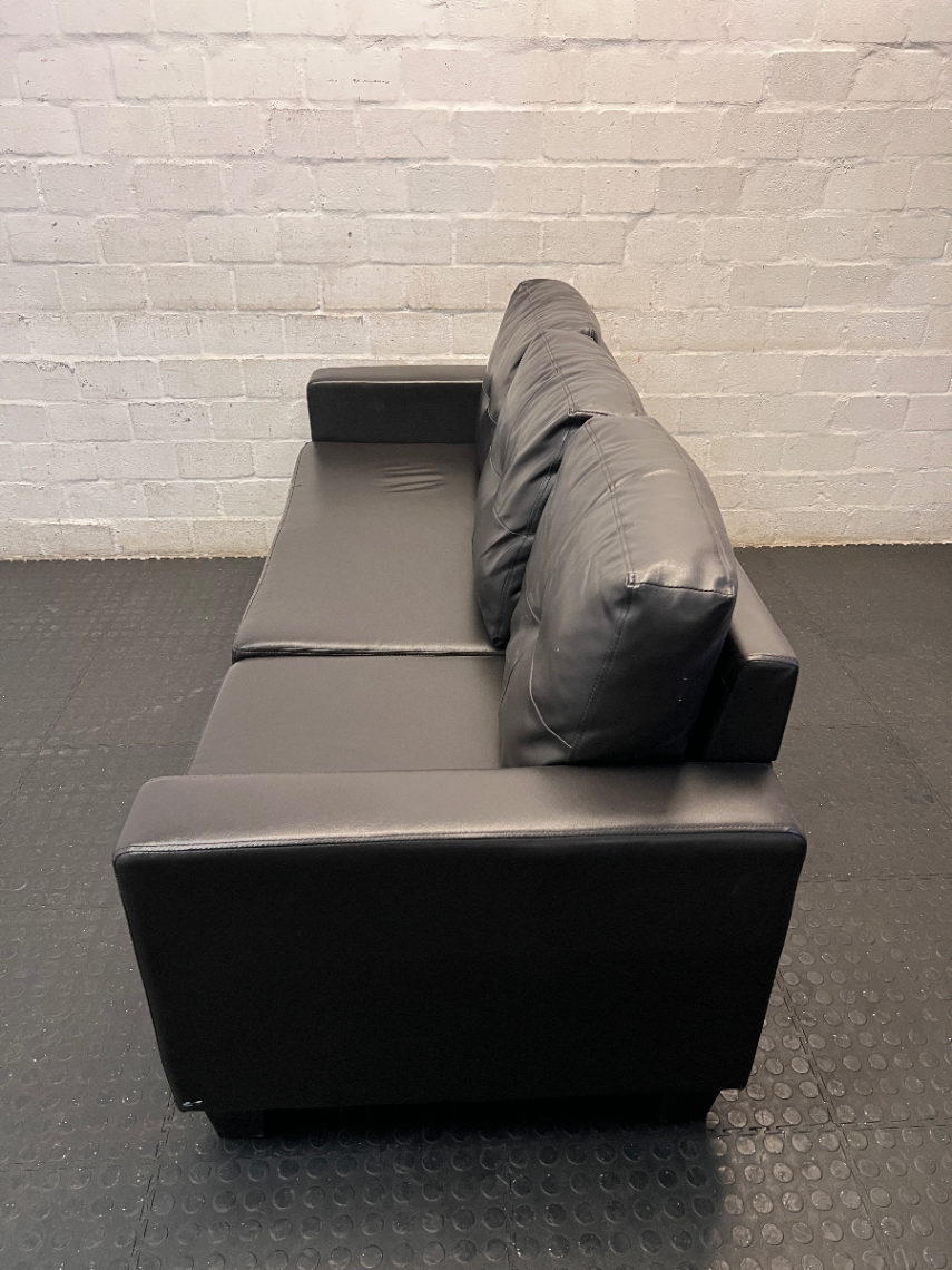 Black Faux-Leather 3 Seater Couch — Torn Under-Fabric and Edge Tearing