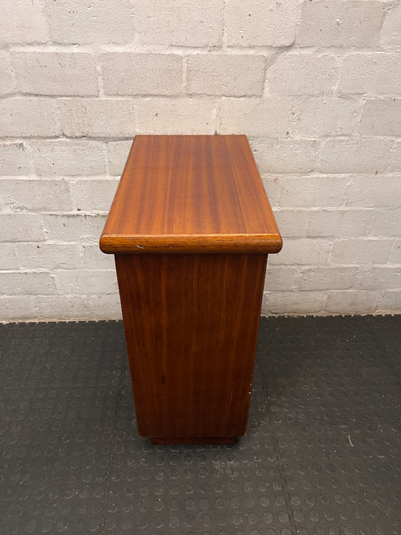 Compact Wood TV Unit with Storage Doors — Fair Condition with Surface Wear