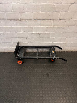 Black Metal Platform Trolley with Mesh Base — Fair Used Condition with Visible Wear
