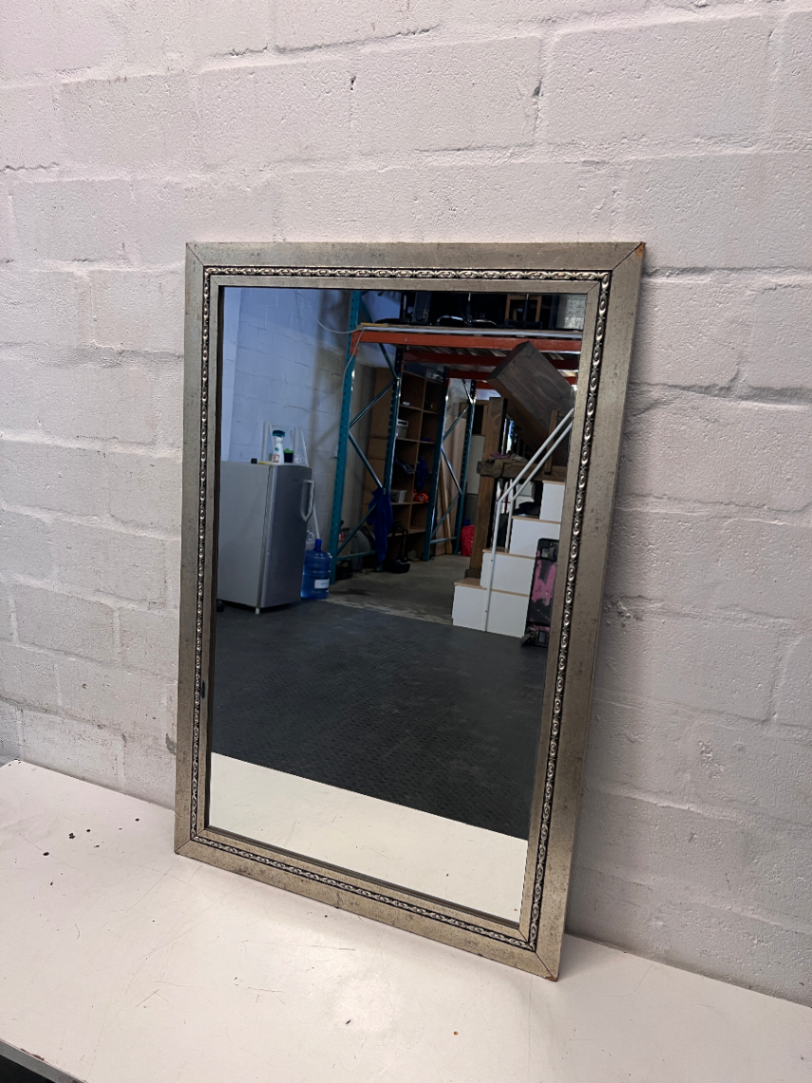 Rectangular Silver-Toned Mirror with Ornate Frame Detail