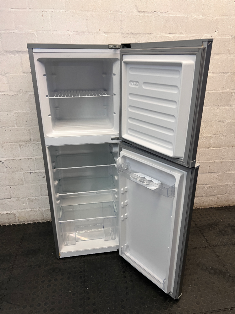 KIC Top-Mount Fridge Freezer in Silver — Working Order with Chipped Door Shelf