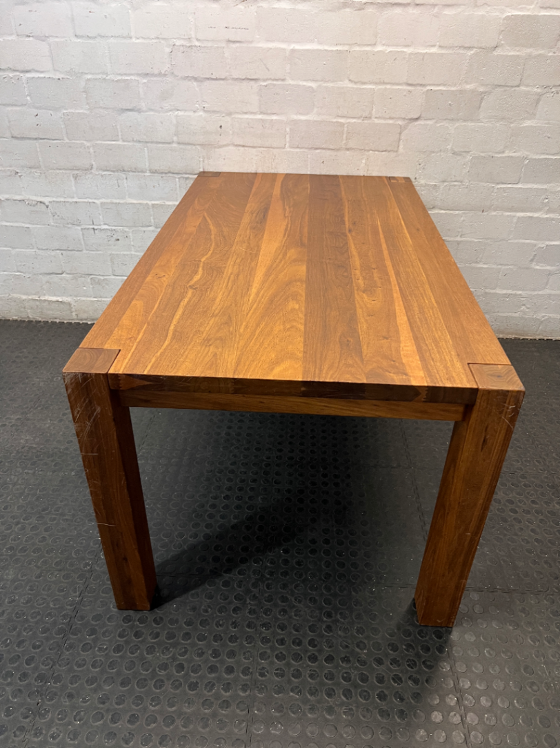 Weylandts Brown Wood Dining Table — Minor Scratches on Side Legs