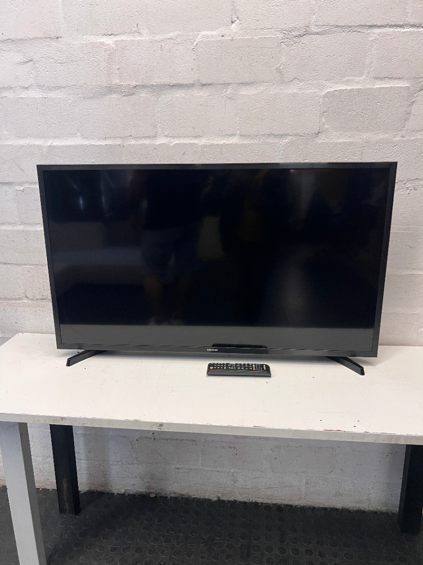 Sleek Black Flat Screen Television — Working Well in Fair Used Condition