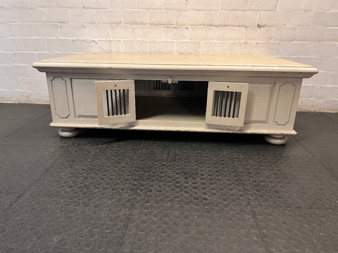 Cream Panelled Wood Coffee Table with Bun Feet — Visible Wear and Paint Chipping