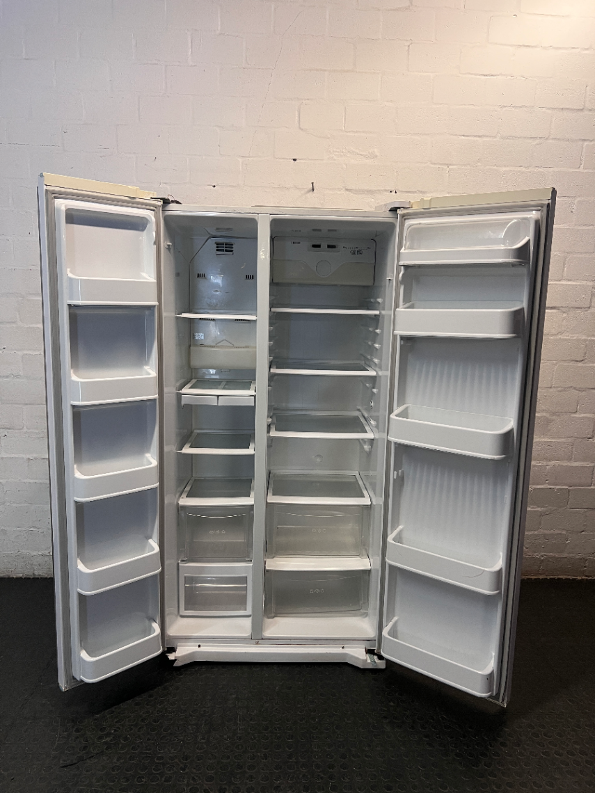 White LG Side-by-Side Fridge Freezer — Good Working Order with Dents on Doors