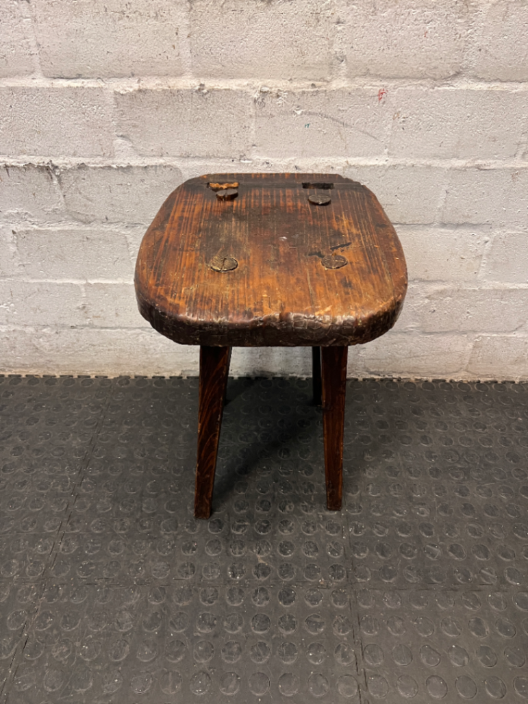 Rustic Hand-Carved Three-Legged Wooden Stool