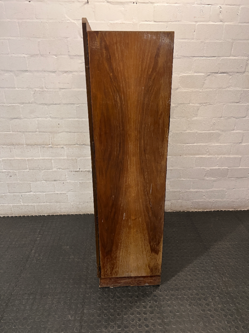 Vintage Dark Wood Two-Door Cupboard — Vintage Condition with Surface Wear and Stickers