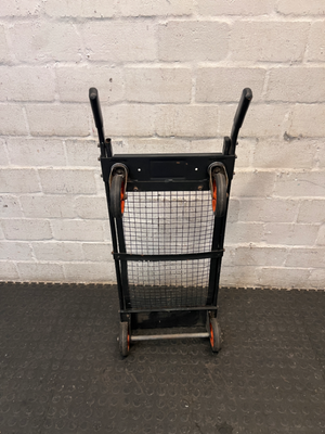 Black Metal Platform Trolley with Mesh Base — Fair Used Condition with Visible Wear