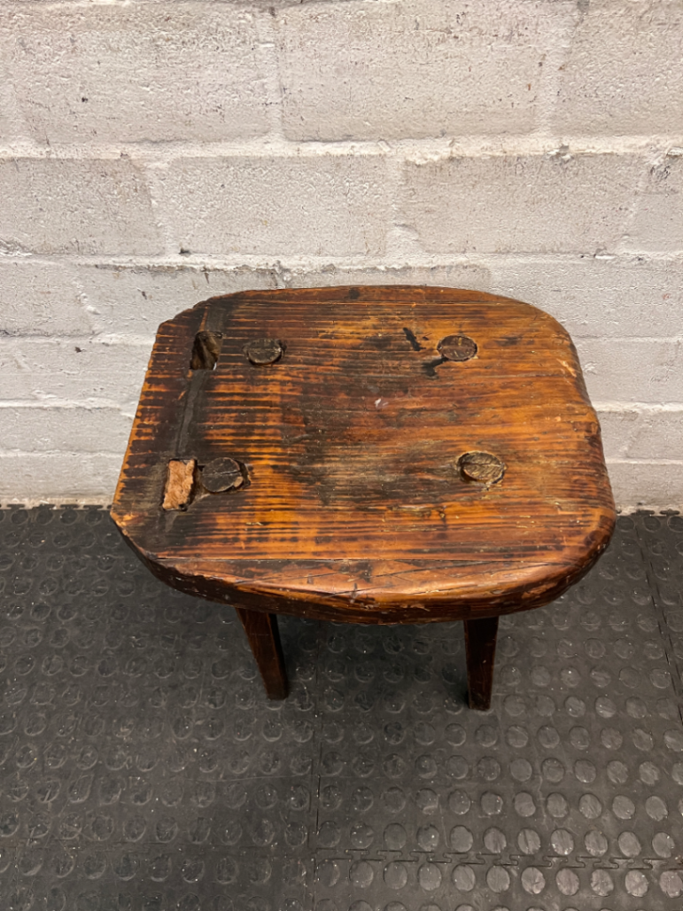 Rustic Hand-Carved Three-Legged Wooden Stool