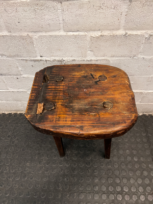Rustic Hand-Carved Three-Legged Wooden Stool