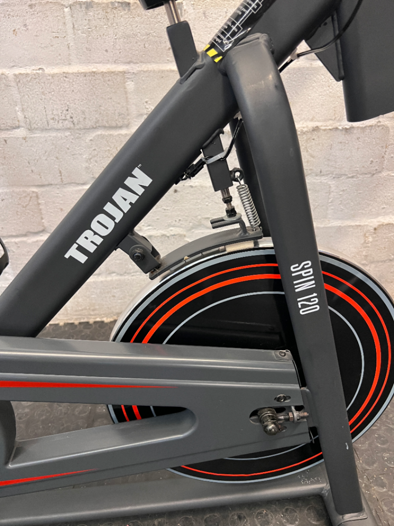 Trojan Spin 120 Exercise Bike in Dark Grey — Good Working Order; Missing Sticker on Wheel