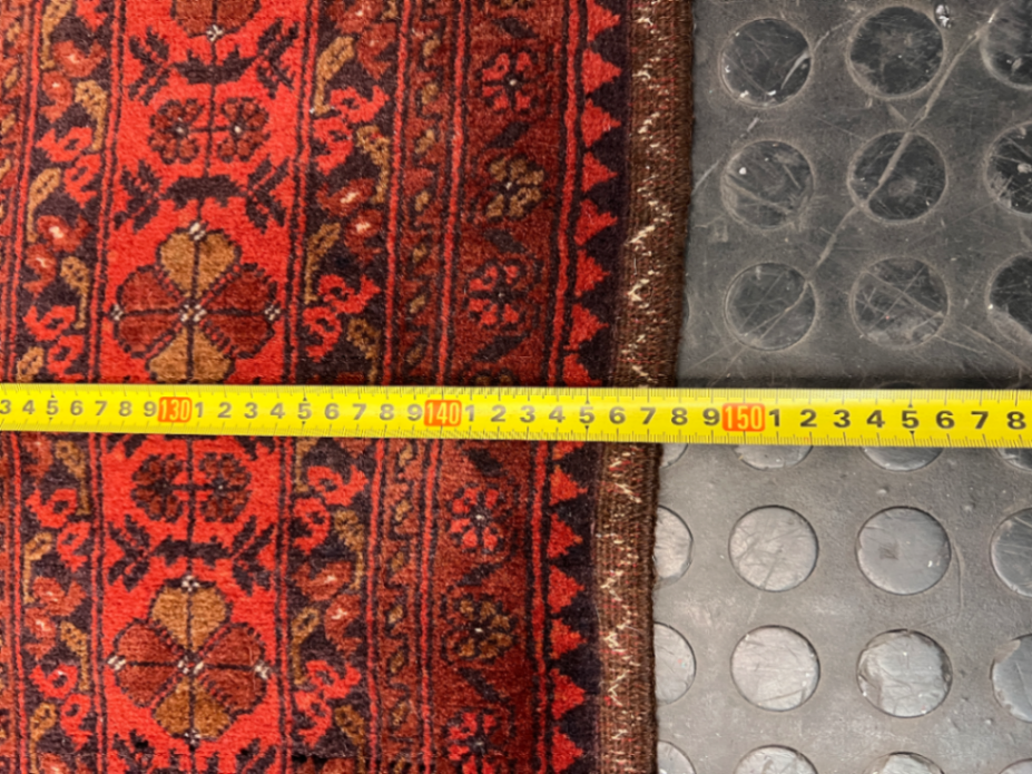 Intricate Red Persian Style Fringed Rug — Fair-Used Condition