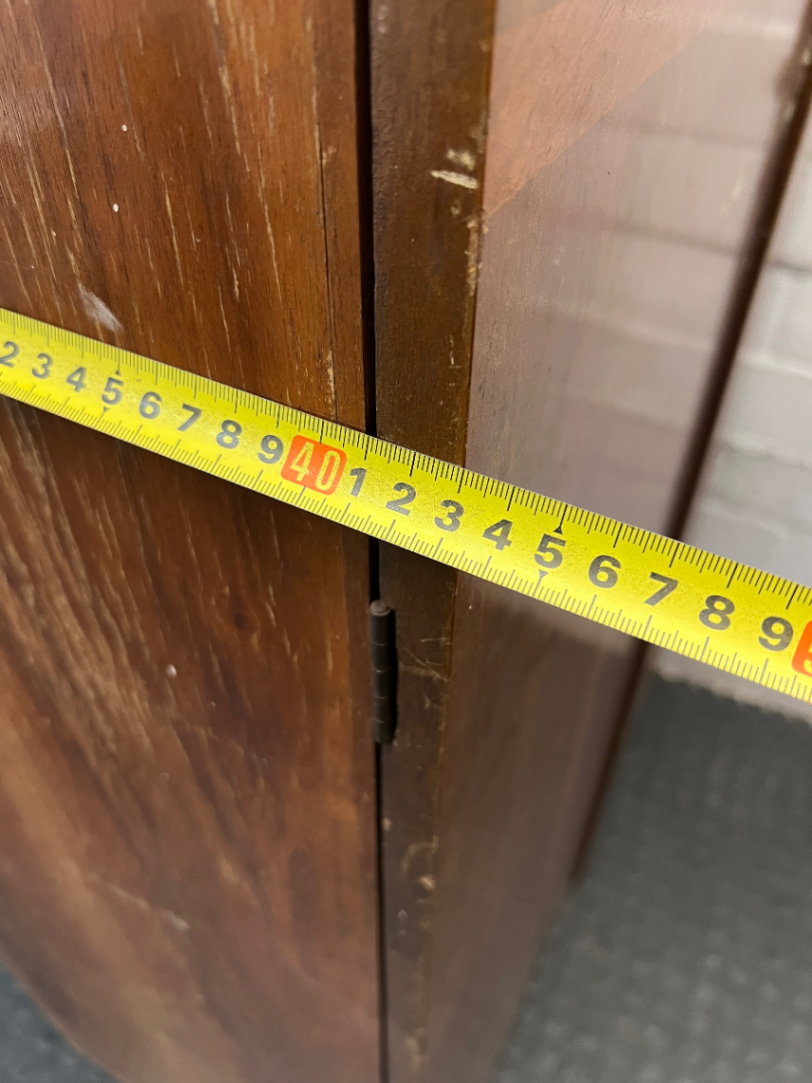 Vintage Dark Wood Two-Door Cupboard — Vintage Condition with Surface Wear and Stickers