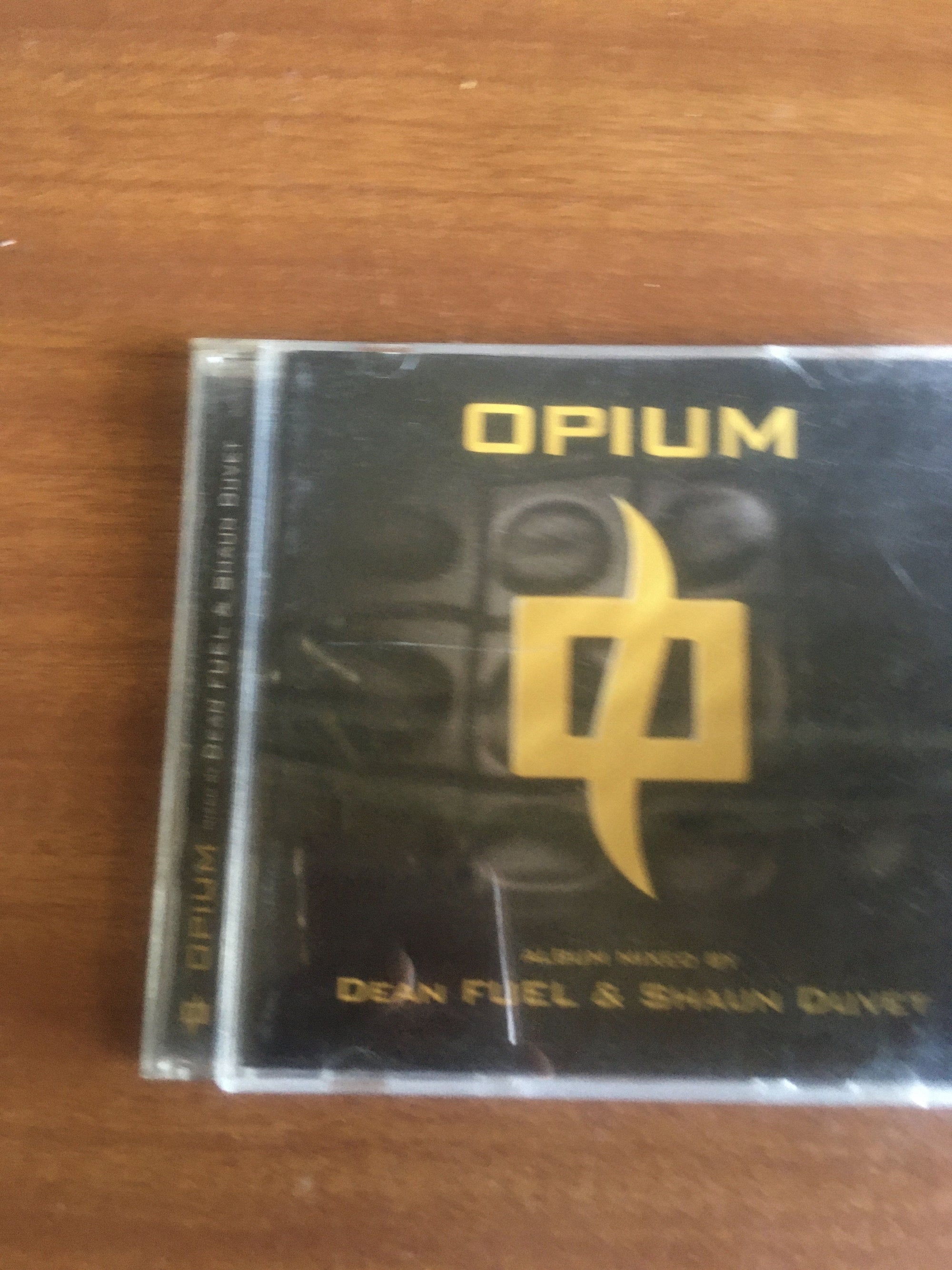 Opium(Cd) - 2ndhandwarehouse.com