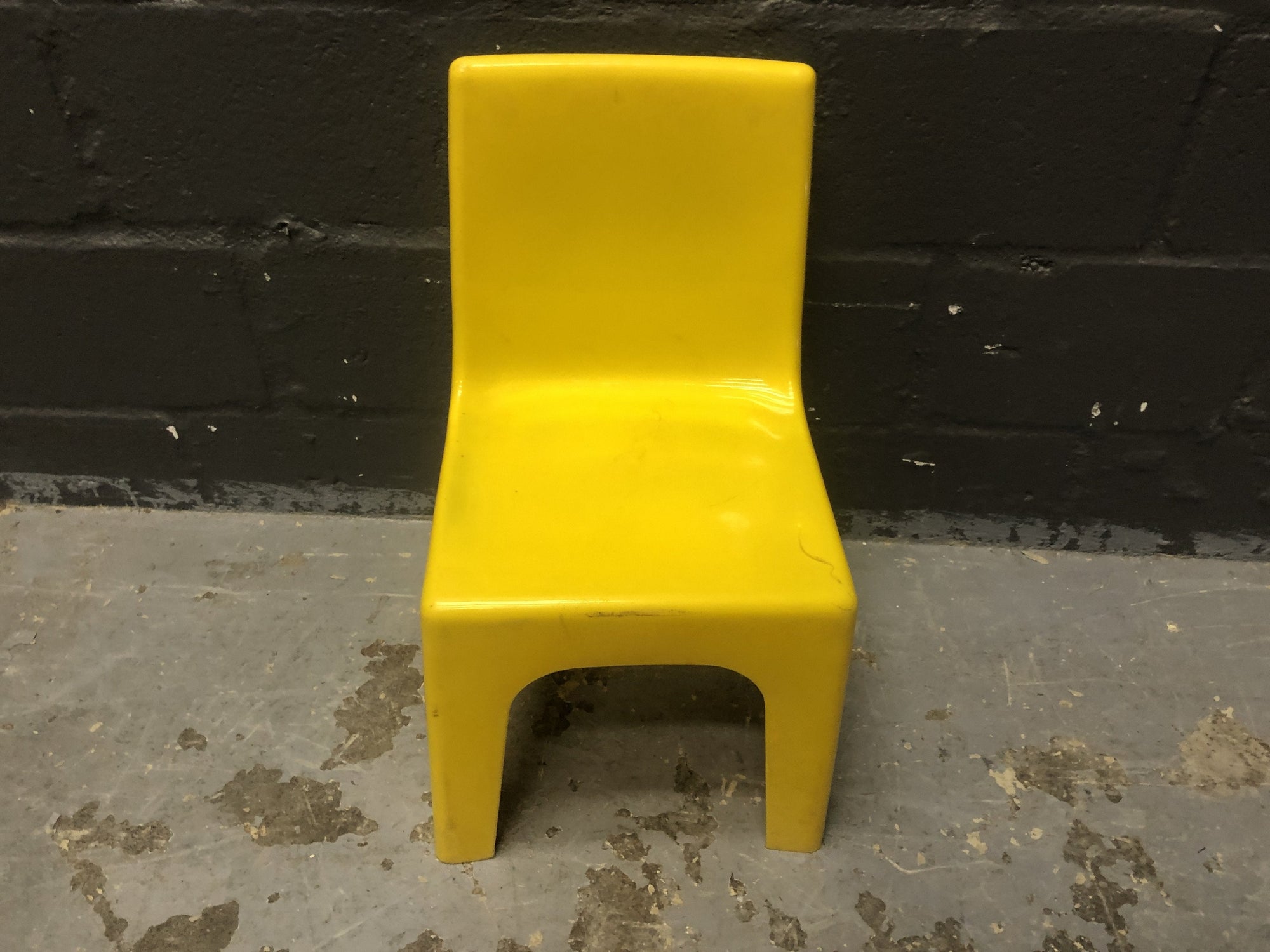 Kid plastic chair in yellow