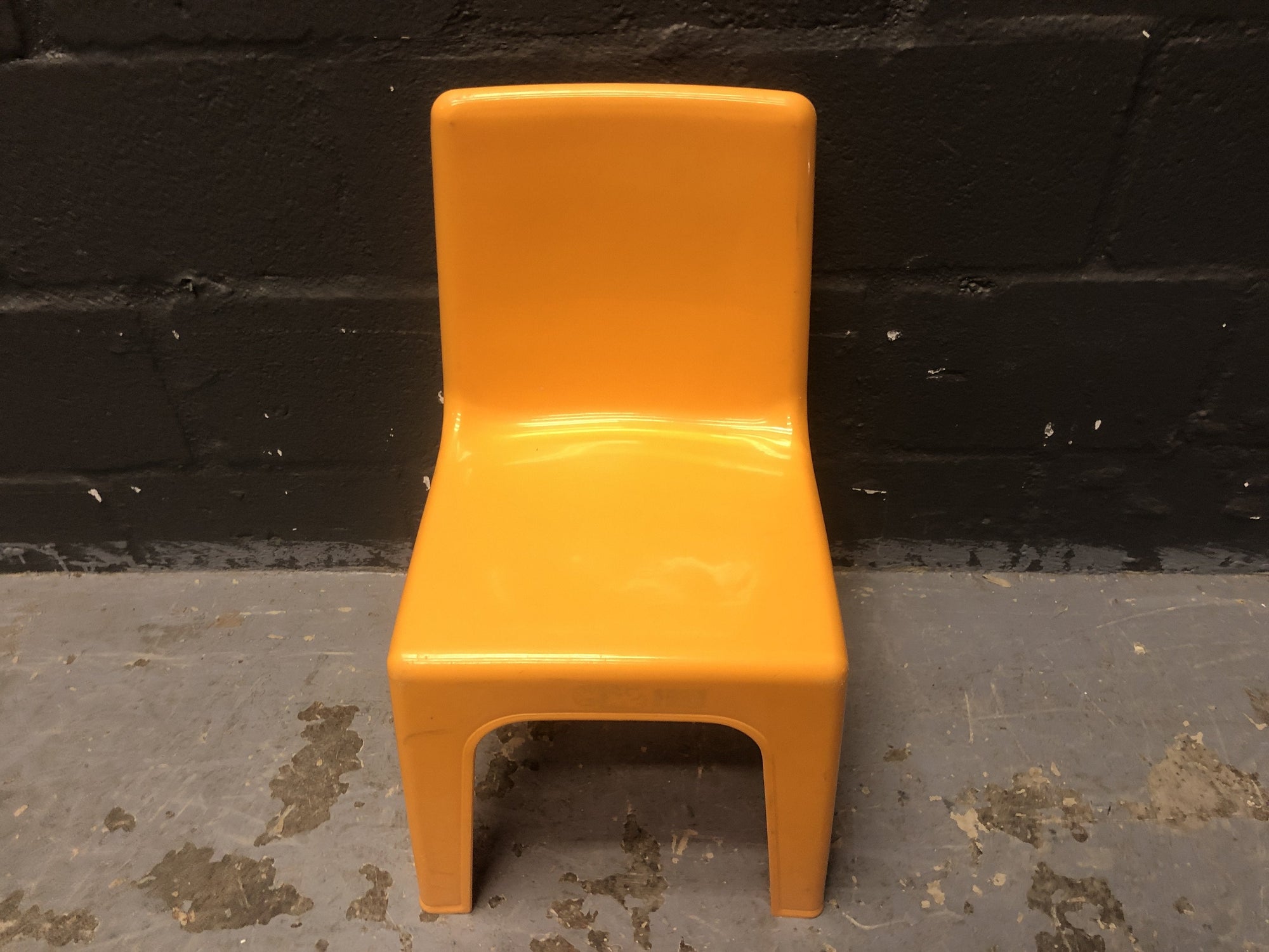 Kid plastic chair in orange