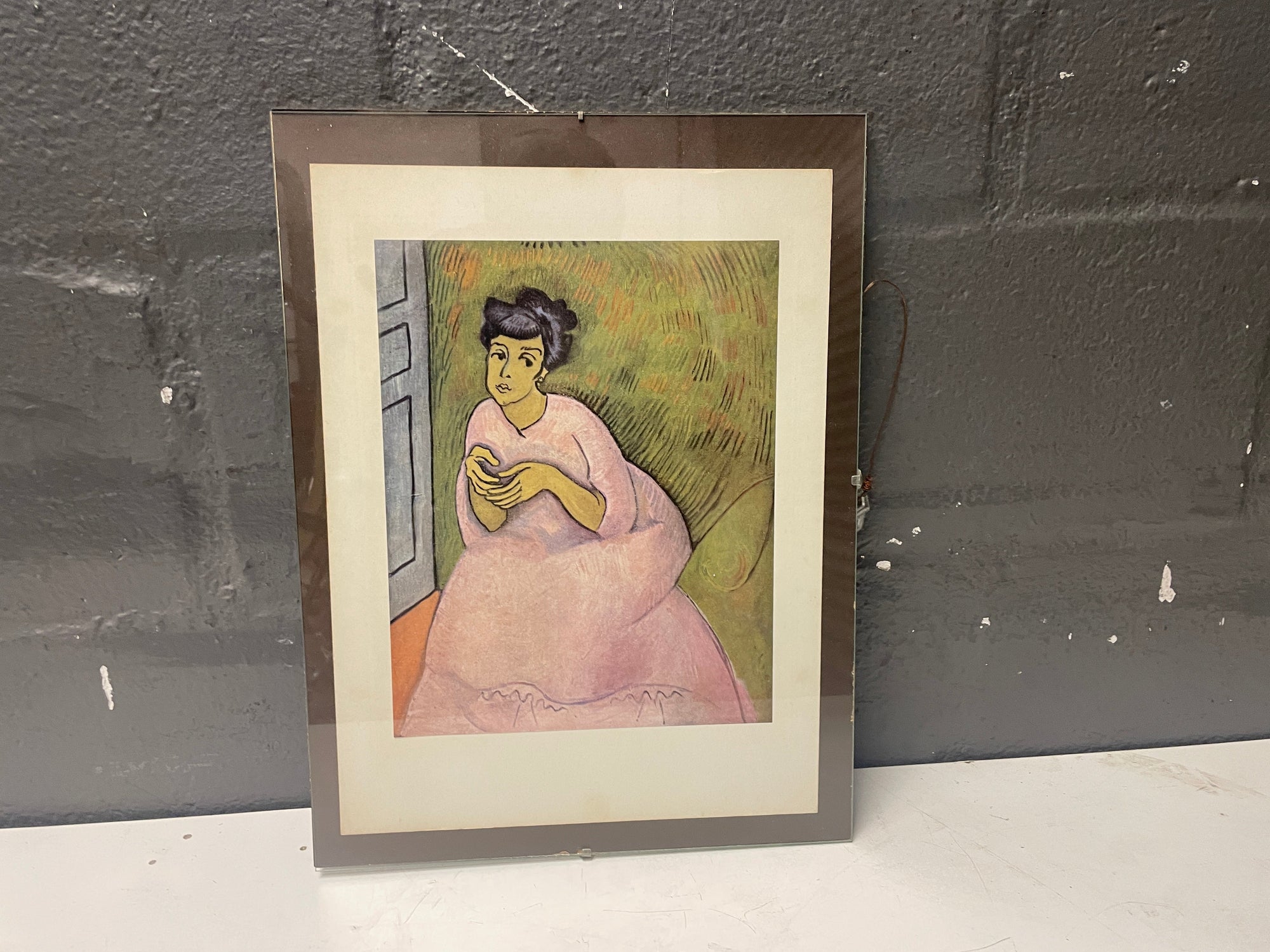Framed portrait of a lady in pink